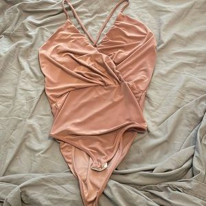 Deep V blush body suit